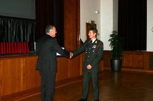 Rear Adm. Willem Voogt, RNLN (Ret.) (l), chapter president, presents a certificate of appreciation to Lt. Col. Marcel Duvekot, RNLA, chief of staff, Regional Military Command (RMC) West, who served as a guest speaker in October.